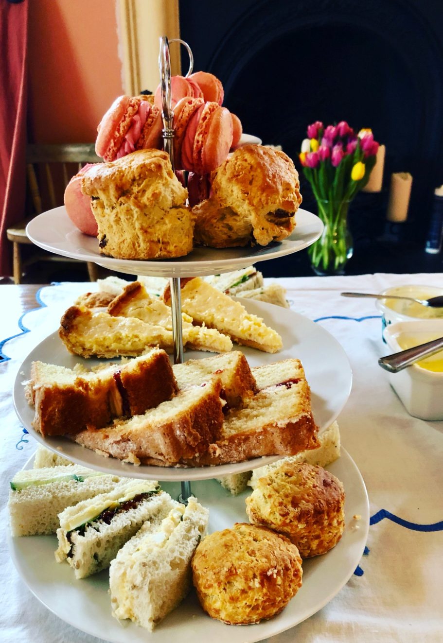 Appetising selection of sandwiches scones and cakes on afternoon tea stand Appetising selection of sandwiches scones and cakes on afternoon tea standand cakes on afternoon tea stand