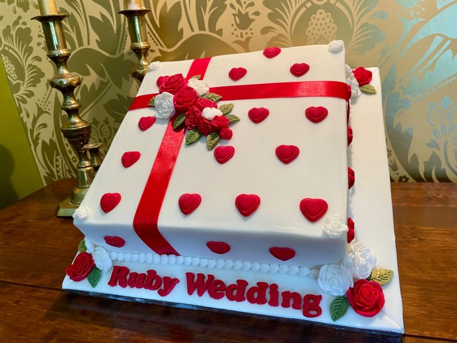 Ruby Anniversary Cake Square Ruby Wedding Anniversary cake decorated with red hearts